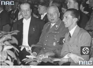 1935 02 25 Berlin - koncert Jana Kiepury. W pierwszym rzędzie od lewej ambasador RP Józef Lipski, książę Carl Eduard von Sachsen-Coburg-Gotha pomiędzy nimi z tyłu mjr W Steblik. (zbiory NAC)